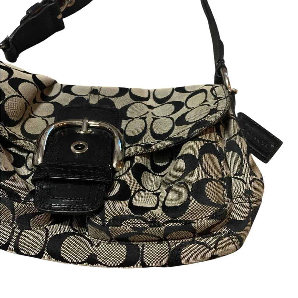 Coach Soho Signature Y2K shoulder bag in Grey with a big black buckle